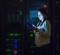 Young-woman-working-on-digital-tablet-in-server-room_960x620