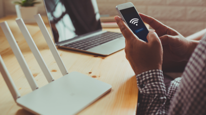 Someone connects a smartphone to a connected object
