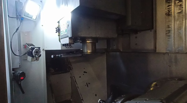 Photo showing the camera installed in the production machine at Prolann. The camera features a suitable housing (waterproof, robust) and a wiper for cleaning the lens from oil splashes.